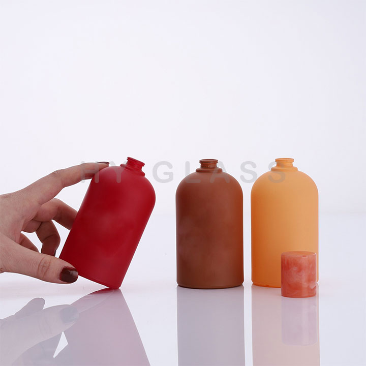 Luxury 100ml cylinderical solid color glass fragrance perfume bottle supplier